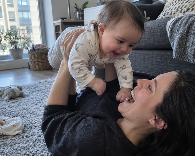 A parent enjoying a quiet moment with their baby